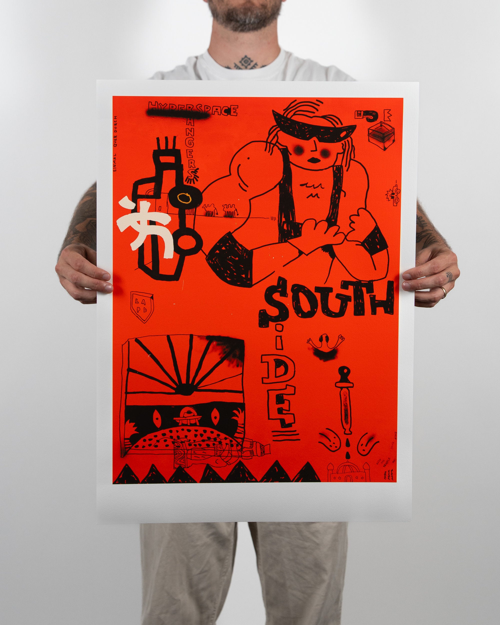 Premium unframed graphic art print Hyperspace Rangers by RETRO23 held by a person in an artist studio setting.