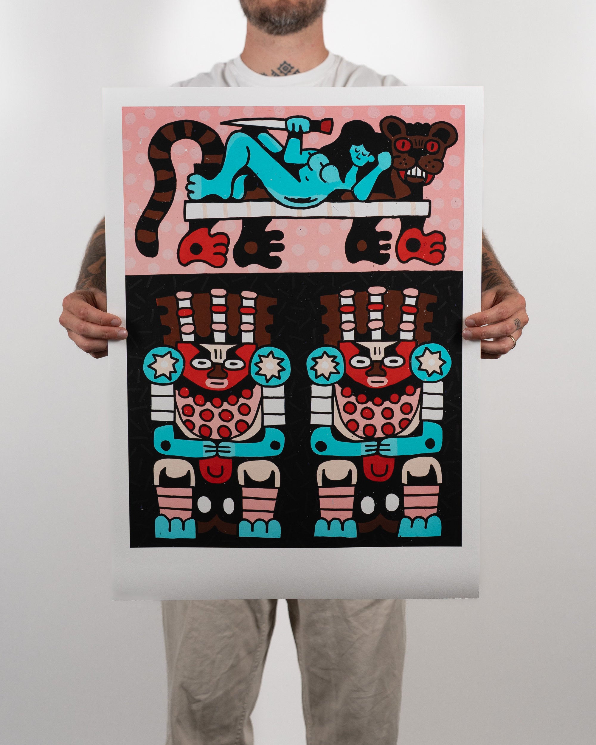 Full shot of a person holding the physical Turquoise Suns fine art print by RETRO23, showing the colorful artwork centered with a wide white border.